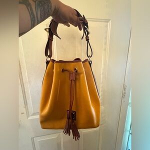 SOLD Yellow Dooney & Bourke drawstring bucket bag